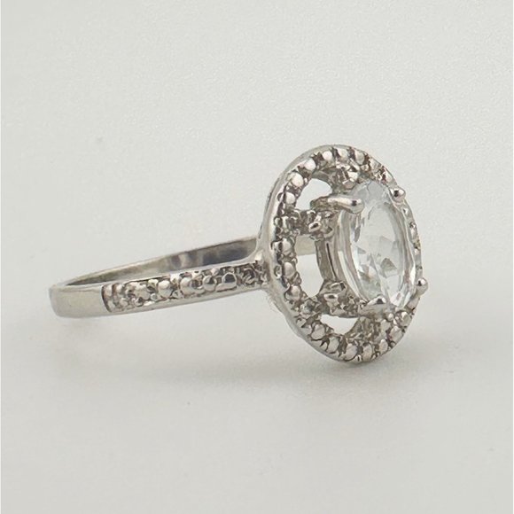Lovely Floating Halo Oval Aquamarine Gemstone Ring with Diamond Accent - .925 - Picture 4 of 8
